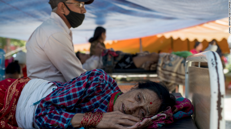 CNN's tweet photo. Today's 7.3 magnitude quake in Nepal has sent traumatized citizens back out onto the streets: http://t.co/HoTBDIhQjf http://t.co/cFRyDKD9FV