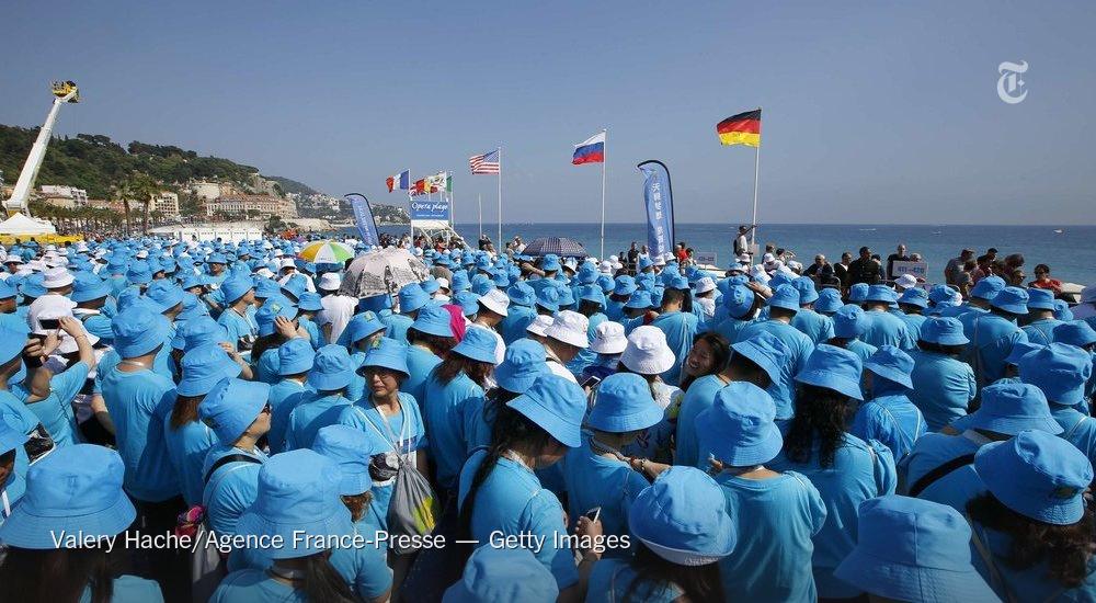 nytimes's tweet photo. The boss of a Chinese company took employees on a trip to France — more than 6,000 of them http://t.co/zKi8EeFfp2 http://t.co/cGKwrsQ6PT