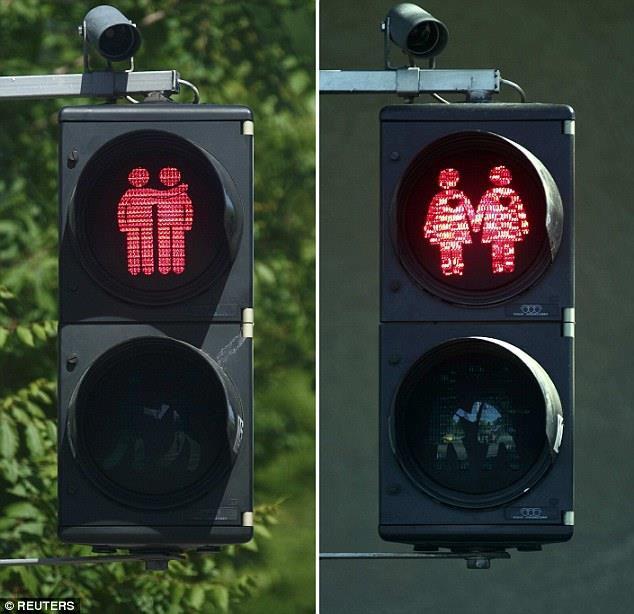 firthy_ben's tweet photo. Loving the effort Vienna is putting into #Eurovision this year with these same sex traffic lights. Cute! http://t.co/gezgOw0TA7