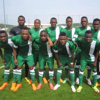ToyinIbitoye's tweet photo. The jersey looks great on the left but not so great on the Flying Eagles on the right....what's your take? http://t.co/LRJD7SMmmj
