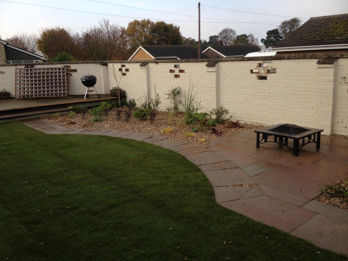 indian sandstone paving and low maintenance planting