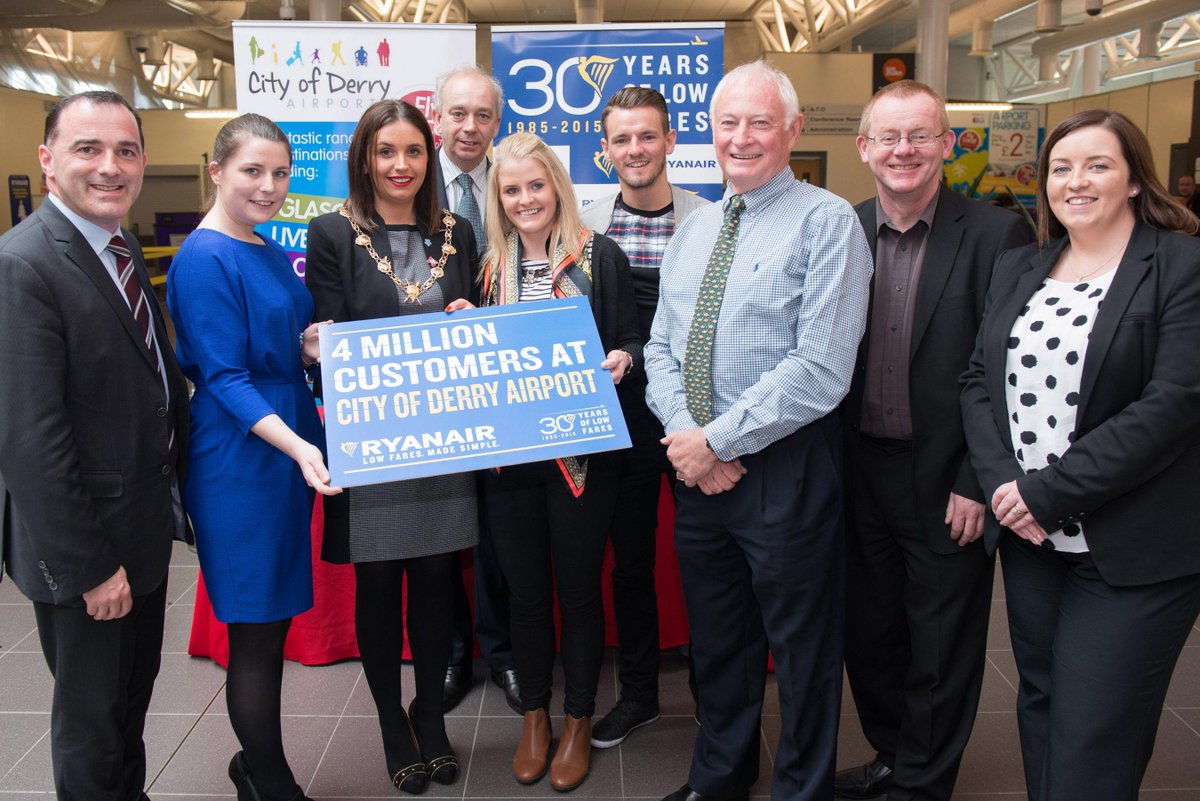 Ryanair's tweet photo. Celebrating our 4 millionth, Kim Newlands and David Waters,  customer @CoDerryAirport yesterday #Ryanair30 http://t.co/sFdhiPG8rA