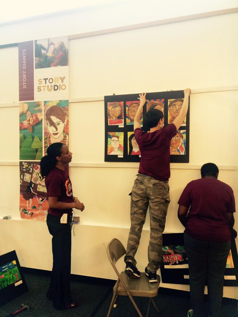 UrbanArtsOrg's tweet photo. Behind the scenes look: setting up Story Studio artwork for our story slam! #uaf2015 #packthepalace #artsed http://t.co/XPQPzgzwfv