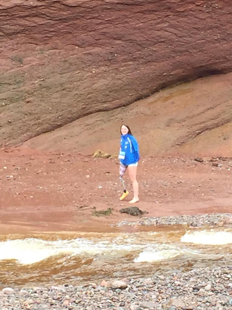 SSRCE_science's tweet photo. Braving the cold water to explore a sea cave. We just can't resist! @cwsf_ysc @SouthShoreRSB #CWSF2015tourday http://t.co/IgerREVBam