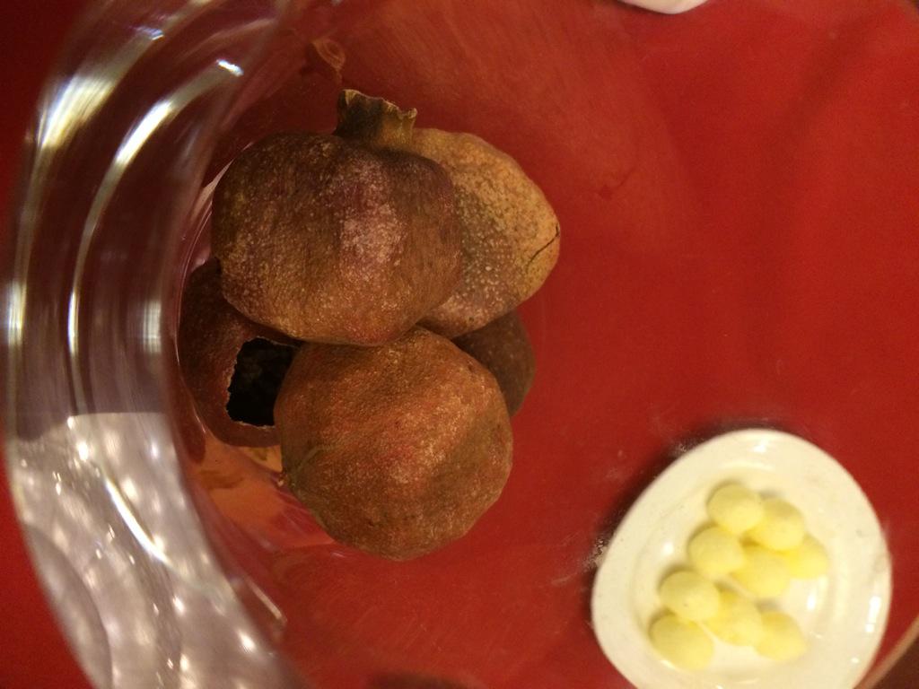 HagenBetsy's tweet photo. "@BettyKLochner: Guess the centerpiece. Really, what is it? #CSPN2015 http://t.co/Ra8mP7ZlbV". Figs?  Pomegranates?