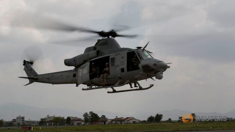 ChannelNewsAsia's tweet photo. Nepali PM’s chopper airlifts woman with serious head injury to hospital after #NepalQuake2 http://t.co/8ORz1PifdR http://t.co/YZHf77Uaoz