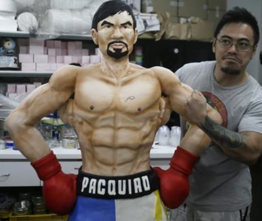 AP's tweet photo. RT @AP_Sports Filipino baker makes life-sized cake of @MannyPacquiao:http://t.co/B9thncuNW8 #MayPac http://t.co/jSaoWrLRKK