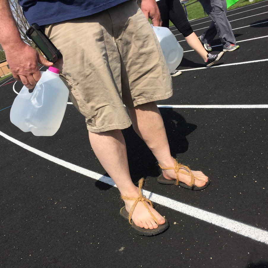teacher6th's tweet photo. .@sebald is so stylish today with his rubber tire/twine shoes! Remember #watermatters http://t.co/PO8BEXPirf