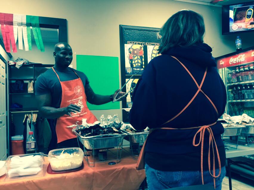 APS Scotty dancing as he serves ribs at 4634.