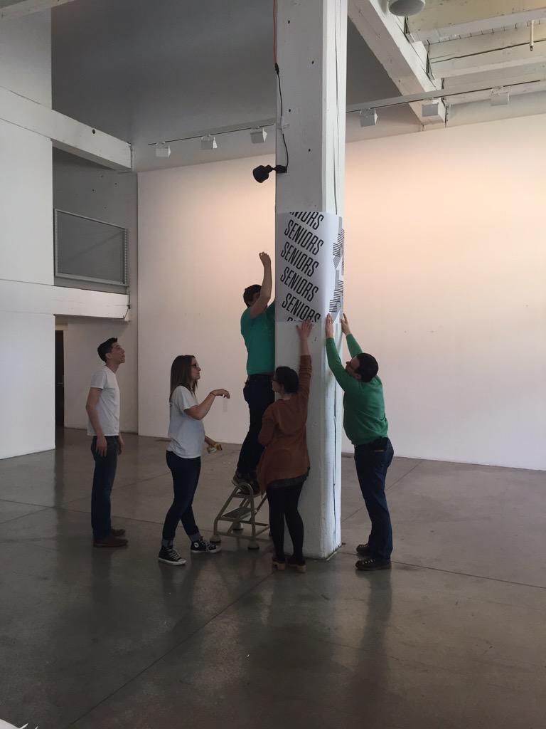 psugd's tweet photo. How many #psugd students does it take to hang a poster? #BeHonest2015 http://t.co/kaNH29eHqT