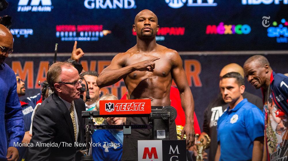 NYTSports's tweet image. Our live blog of Mayweather-Pacquiao is up and running. Follow along, or check back later. nyti.ms/1dDG6Gk