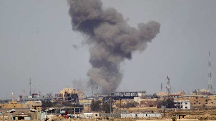 RT_com's tweet photo. US-led airstrikes killed 52 Syrian civilians in a day, incl. 7 children, but no ISIS fighters  http://t.co/rjCYSsbtPc http://t.co/hQ7I3Ahgfp