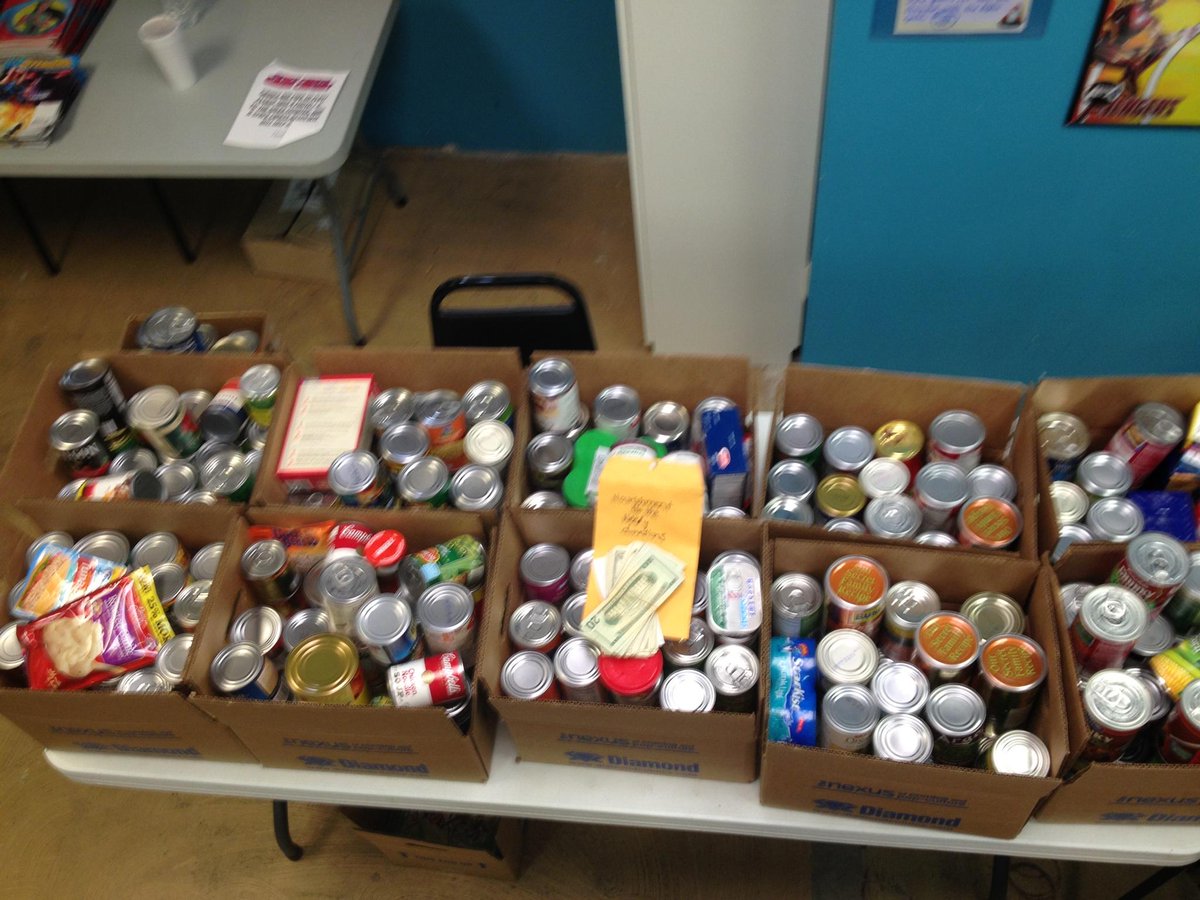 commanderking's tweet photo. Huge #fcbd donations! $300+ cash plus 11 #diamondcomic boxes full of canned goods! http://t.co/cEbgqRqiWc