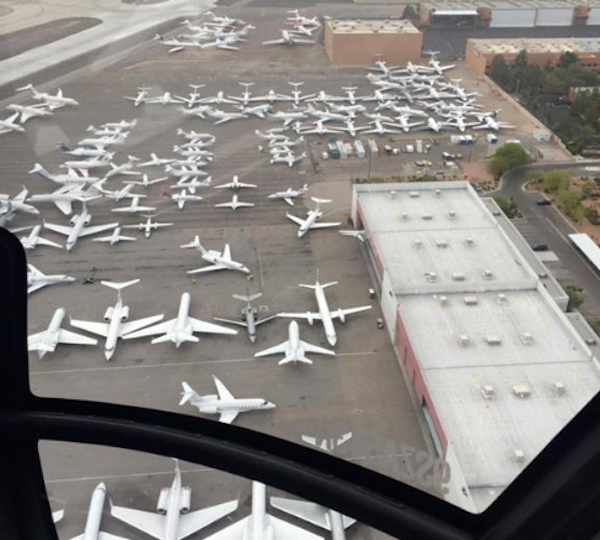 theScore's tweet photo. There are a few private jets at the Las Vegas airport for some boxing match tonight. http://t.co/XnHhoMwxGp http://t.co/sLdnbj4XSu
