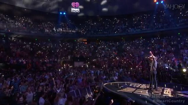 iHeartRadio's tweet photo. .@justincolemoore getting lights up for “If Heaven Wasn’t So Far Away” - we may or may not be crying 😭 #iHeartCountry http://t.co/0XhqEPY5tK