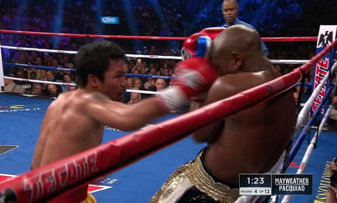 BleacherReport's tweet image. Manny lands a flurry of punches with Floyd against the ropes!