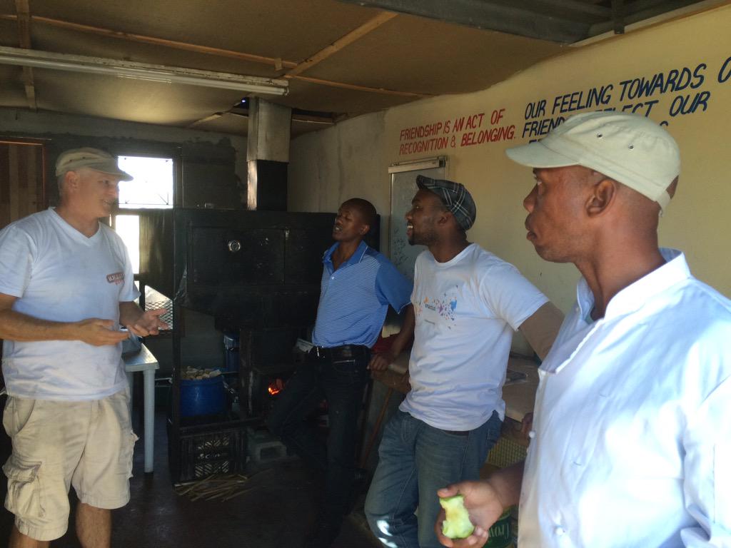 BREADrev's tweet photo. beautiful afternoon in the mother city & we get to share our passion with guys from @message_sa. #baking4change http://t.co/rvr59AdPxQ