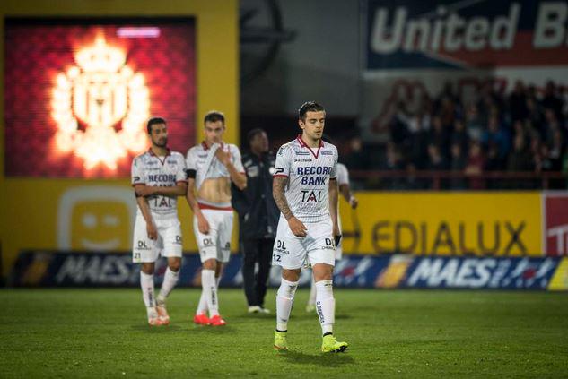 Trajkovski walks off the pitch after the loss Trajkovski walks off the pitch after the loss