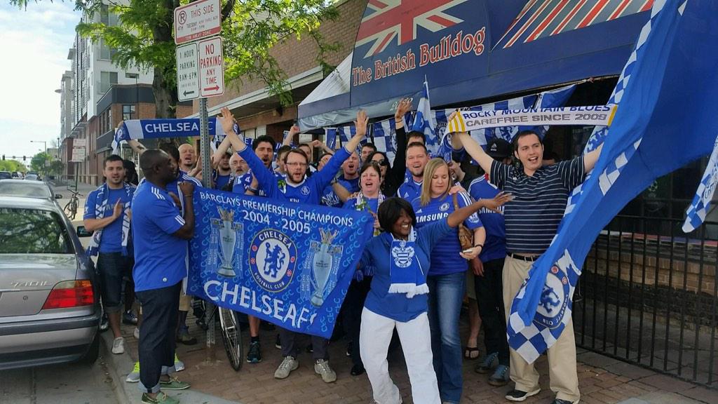 Chelsea fans celebrating outside of The British Bulldog