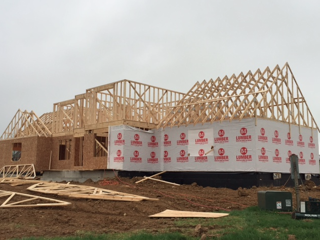 TaylorHomes's tweet photo. And now we begin to wrap it. This is the first step in sealing it up to create an #EnergySmart Home. #TaylorBuild http://t.co/oA5zngaru7