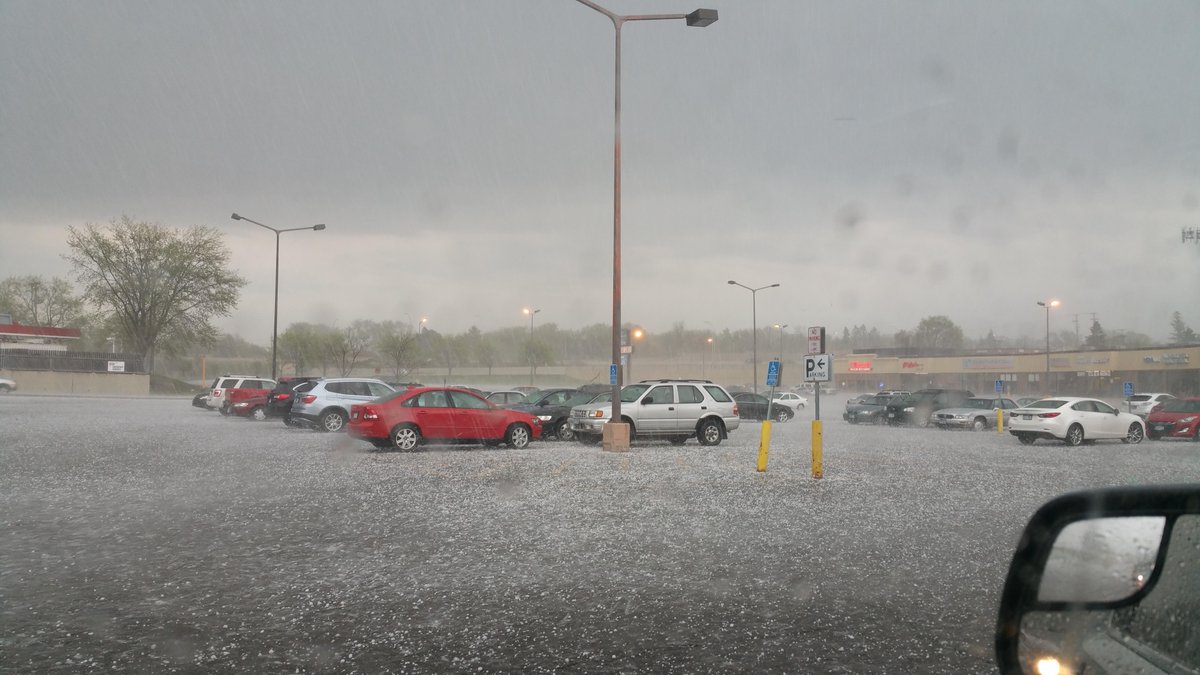 Janmandy's tweet image. Came out of work to the first severe thunderstorm warning of the year.  Hail falling in Golden Valley, MN  #hail