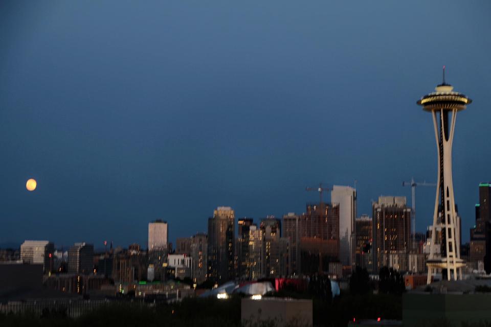 downtownseattle's tweet photo. Did you see the moon last night? It was pretty spectacular. http://t.co/GK7qdvehoo