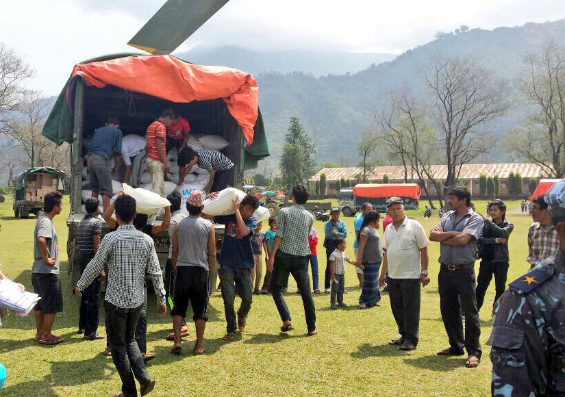 WFPSupplyChain's tweet photo. Food reaches #NepalQuake survivors in remote #Abukhaireni #Gorkha by @WFP helicopter http://t.co/hKWZk3BMhF