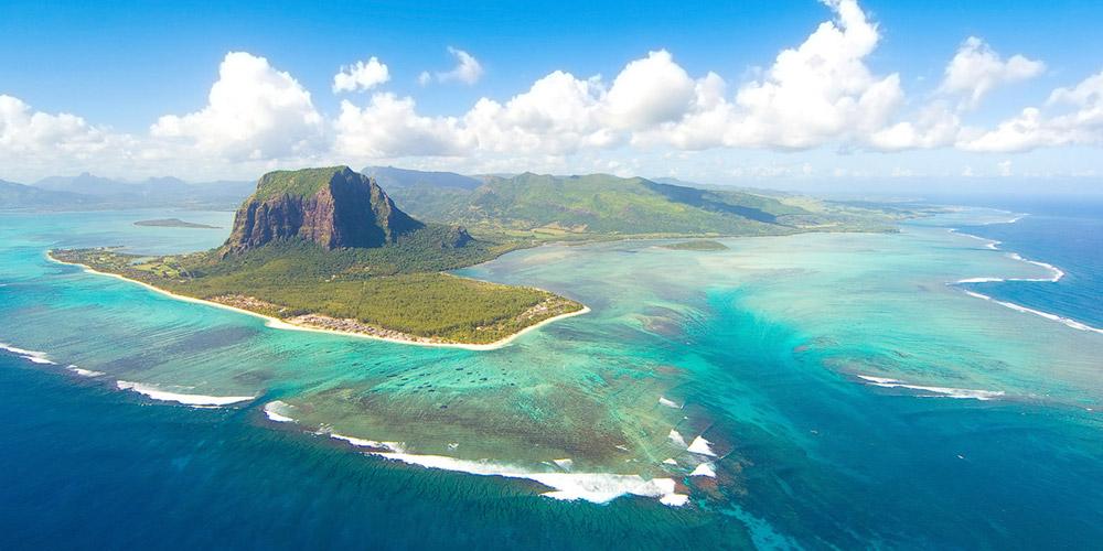 Tripadvisor's tweet image. "Mauritius was made first and then heaven; and heaven was copied after Mauritius." -Mark Twain #TravelersChoice