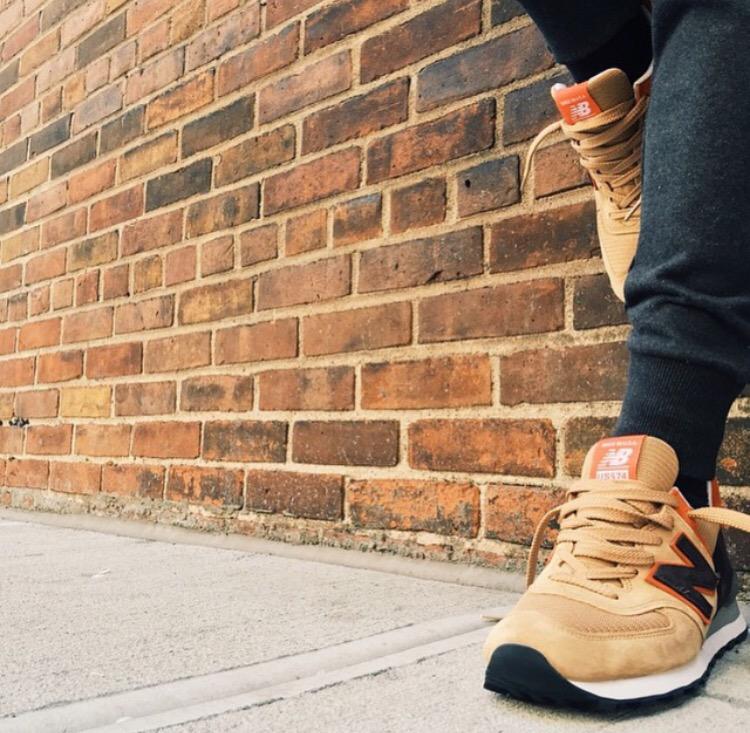 newbalance's tweet photo. NYC sneaker maker shows off her newly designed "Hound Dog" US574s in the flatiron district. #NBCustom http://t.co/O2LQW6axCR