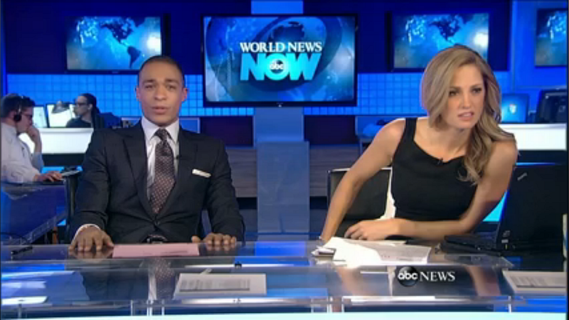 romanov_76_110's tweet photo. .@KaynaWhitworth tries to get a closer look to determine if that is in fact her in the WNN Graphics Dept. photoshop. http://t.co/Tpkp7jj1Iz