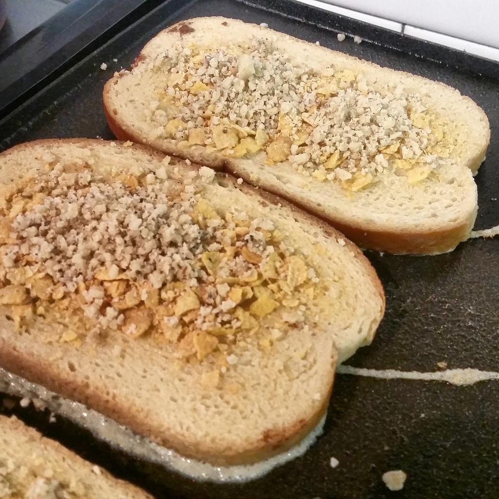 amysplaceri's tweet photo. French toast on the skillet. "Gourmet" style with crushed cereal and walnuts. All day, every day. http://t.co/YhyC6gNahS