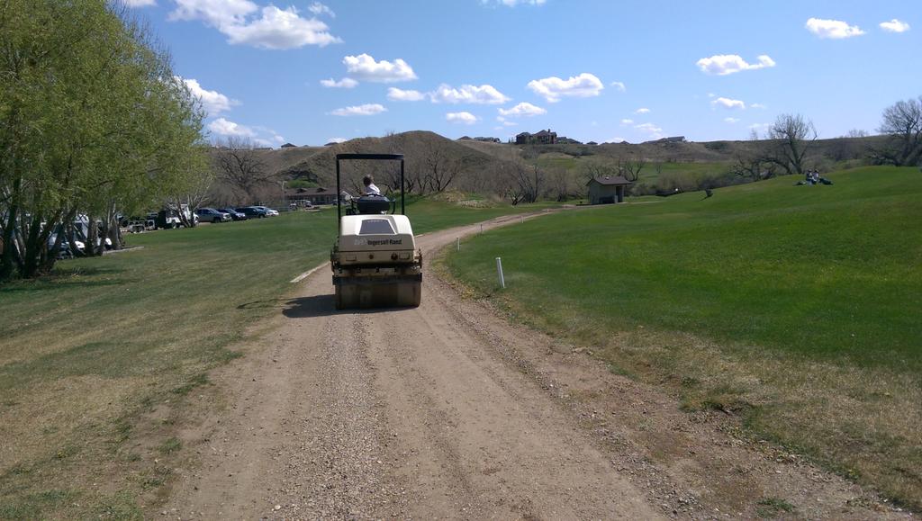 Our new greens roller heading out for the day #overkill