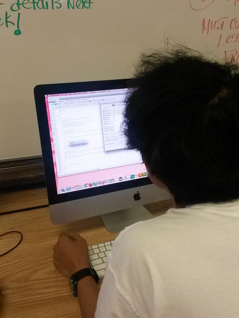 PhiladelphiaGov's tweet photo. Student coding to help build a new website for the Academy of the Arts at Roxborough High School. @ROXCTECOM http://t.co/z6eu3ieJP9
