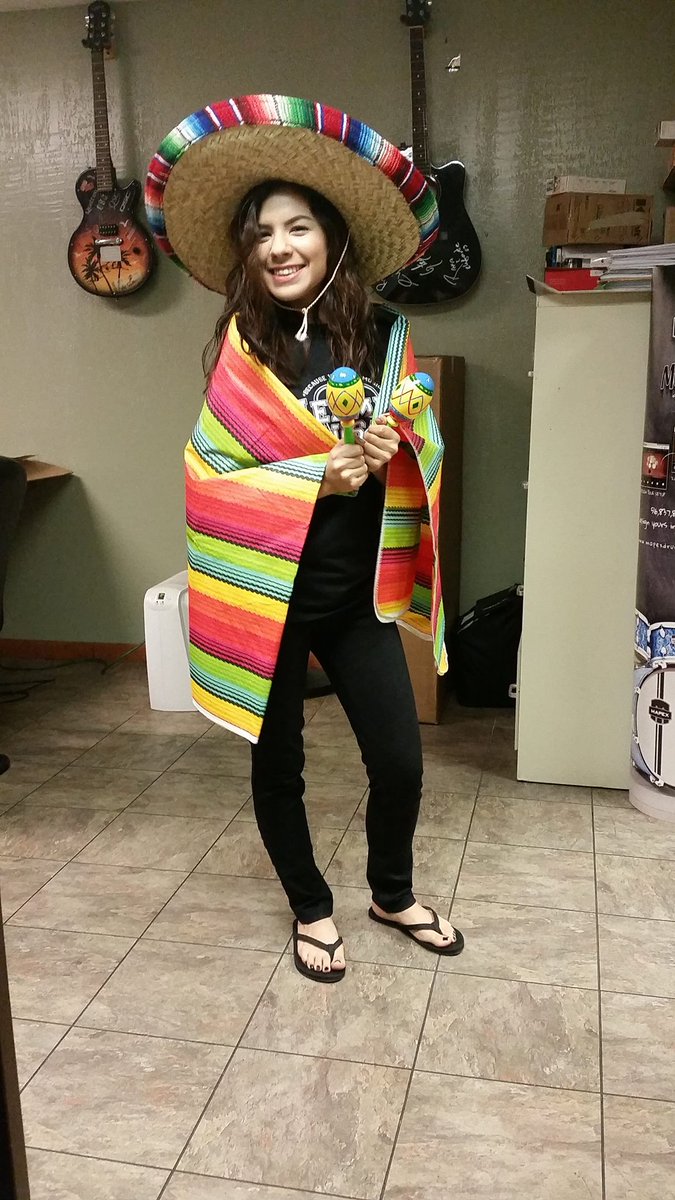 HERMESMUSIC's tweet photo. Denika in pricing is feeling the #cincodemayo spirit! Don't forget, last day of #cincosavings is today! http://t.co/kWPvBfugGR