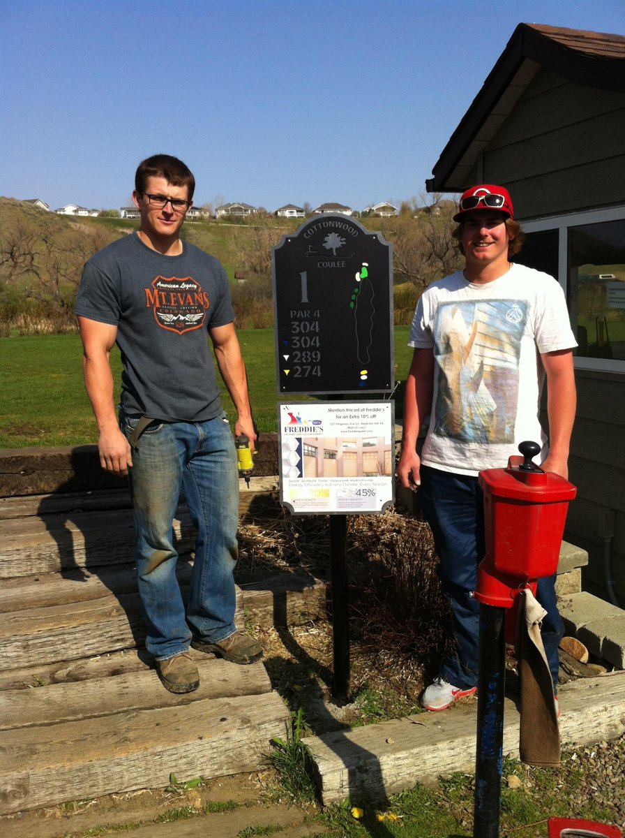 Grounds crew is busy installing the new hole yardage signs made by Ad Caddy in Lethbridge.