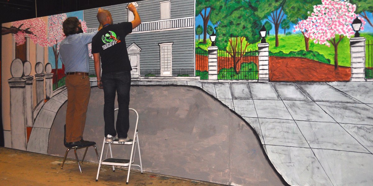 colecasa's tweet photo. Staff members paint finishing touches onto the Mary Poppins backdrop for #ColeCASA's spring musical. #artsinschools http://t.co/1vw3azv3x0