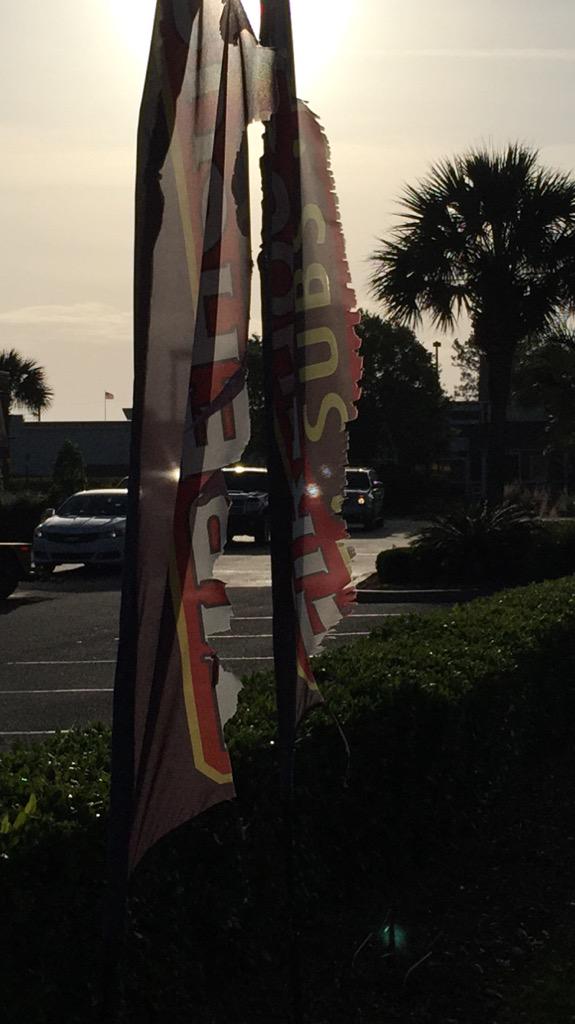 Nationimprint's tweet photo. @FirehouseSubs Need a new feather flag supplier? Ours won't rip like this. Contact @chad_cady We are FL based co. http://t.co/Z9h5l2lpow