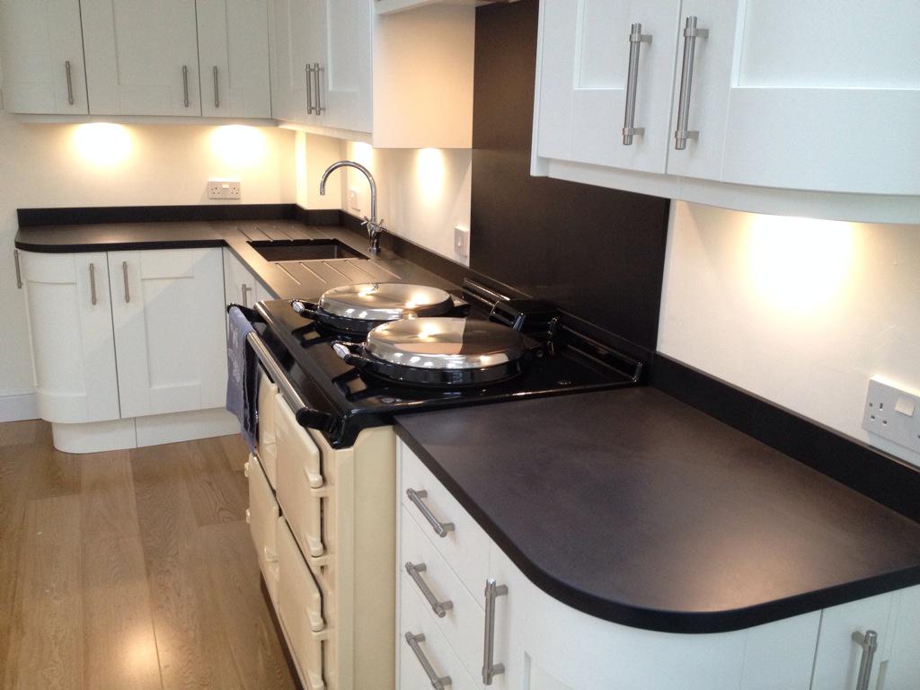 SlateWorktops's tweet photo. @WelshSlateLtd worktops fitted in Winchester last week. Drain grooves either side of a Stainless steel @FrankeUK sink http://t.co/1pfwJK7p3H