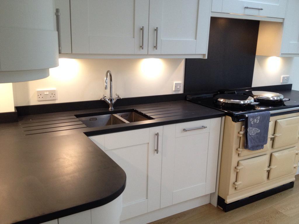 SlateWorktops's tweet photo. @WelshSlateLtd worktops fitted in Winchester last week. Drain grooves either side of a Stainless steel @FrankeUK sink http://t.co/1pfwJK7p3H