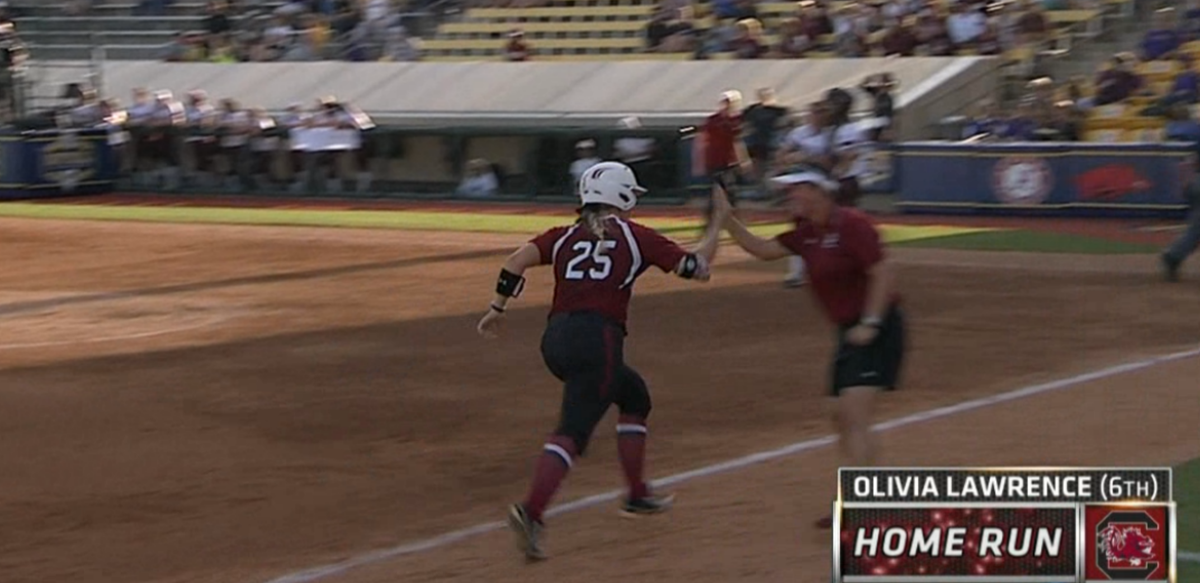 SECNetwork's tweet photo. Goodbye! Home run!

@GamecockSoftbll's Olivia Lawrence ties the game up! #SECSB

Watch Live: http://t.co/fzmOvF8K4y http://t.co/JozpCNaBjm