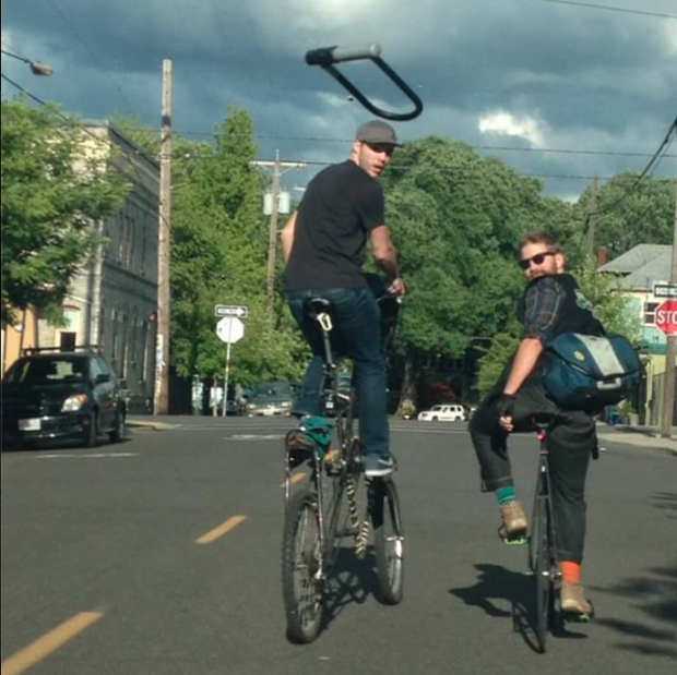 Oregonian's tweet photo. Portland bicyclist photographed throwing bike lock at motorist during road-rage incident http://t.co/kxasMde0tI http://t.co/IFAk97Kq3W