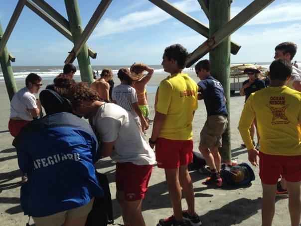 BLigaLive5's tweet photo. Life guards getting ready for safety training on Folly Beach. Very windy and rough waters. #chsnews http://t.co/wgt7CuSbyx