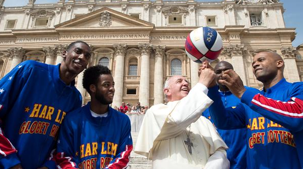 espn's tweet photo. Today Pope Francis became an honorary Harlem Globetrotter and learned how to spin a basketball. (via @Globies) http://t.co/TlHswAHFBo