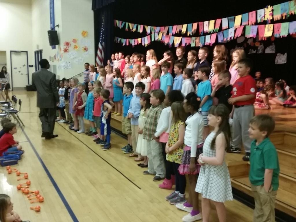 ENFIELD_SDST's tweet photo. First graders sing why It's Easy Being Green during the Festival of the Arts concert @ENFIELD_SDST #EnfieldFOA http://t.co/fZ3gYXCzBk