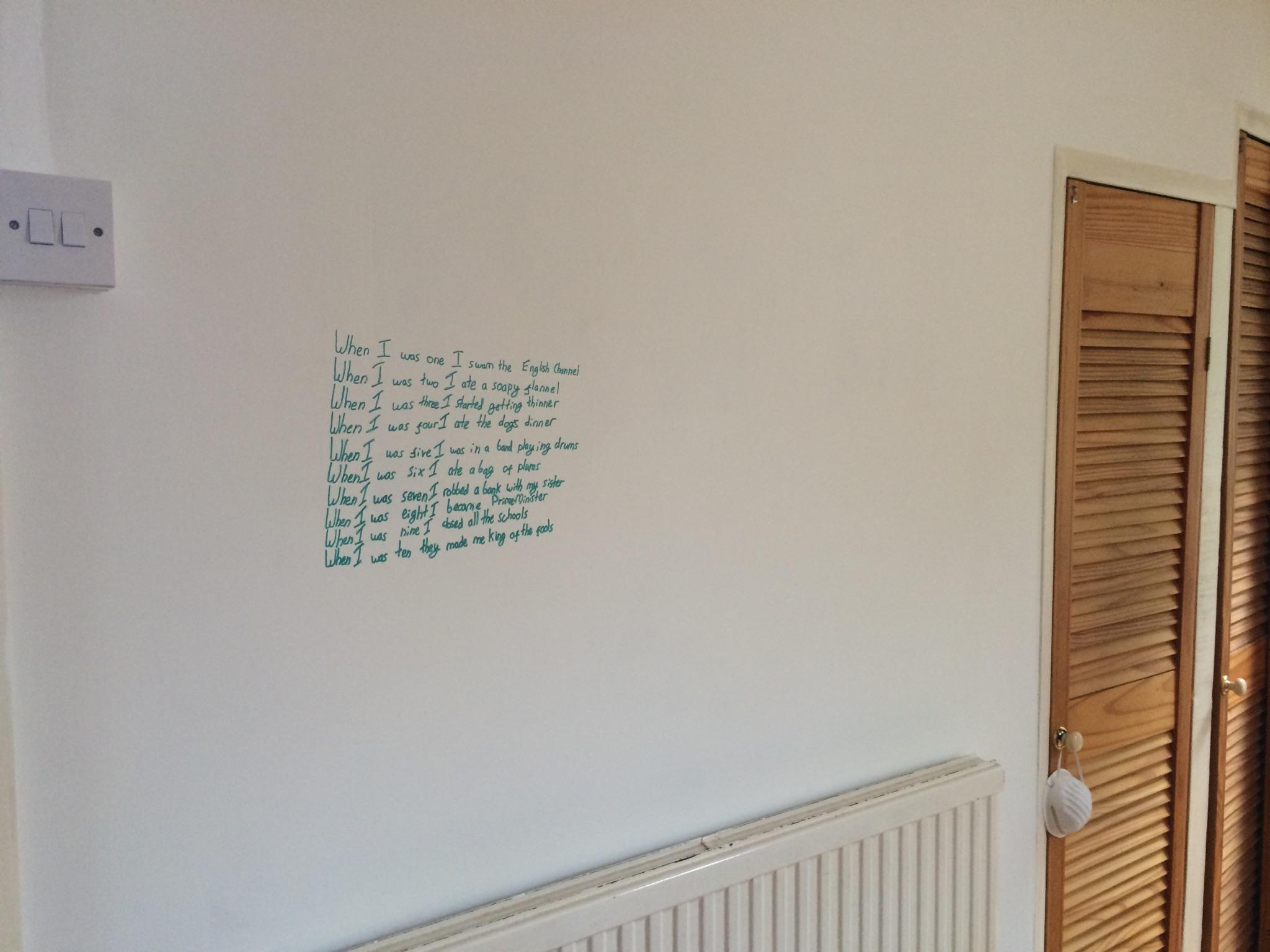 Happy birthday to In his honour the 8yo has written the Michael Rosen Rap on my newly painted wall. 