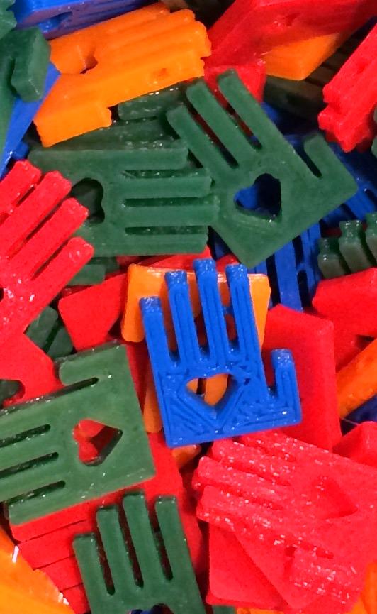 These heart in hand 3d printed <a href="/Enablethefuture/">Enabling The Future</a> trinkets are headed to the <a href="/makerfair/">Maker Fair</a> in California!