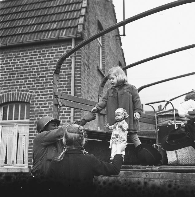 A girl from Roermond is free to return home with her doll after the liberation (1945) tinyurl.com/o46ub29