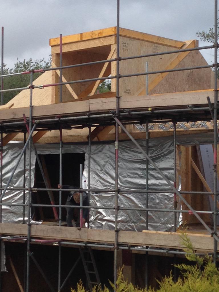 AbsoluteTcltd's tweet photo. SIP houses owing along nicely in Southampton. Roof begun yesterday! Got some big dormers in them http://t.co/0E0ZuGB5oE
