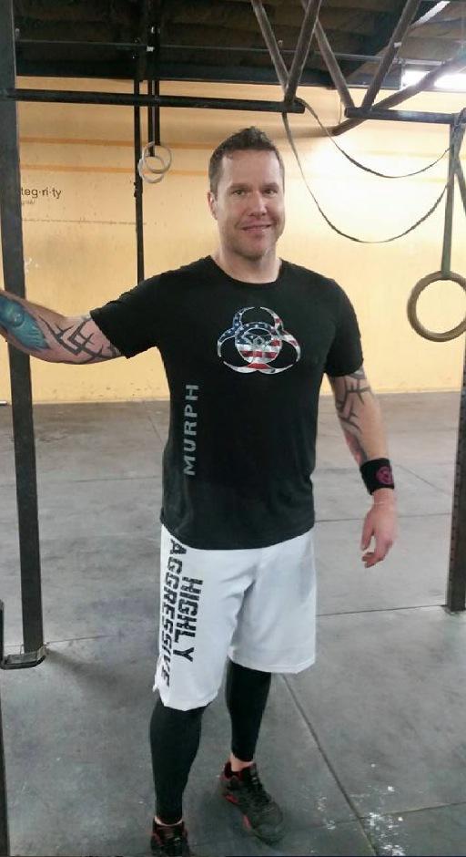 WodLab's tweet photo. Sean rockin' the shirt. Order yours at http://t.co/V1TpsQq7SQ. #wodlab #livesore #crossfit #murph http://t.co/aInIAjMiPM