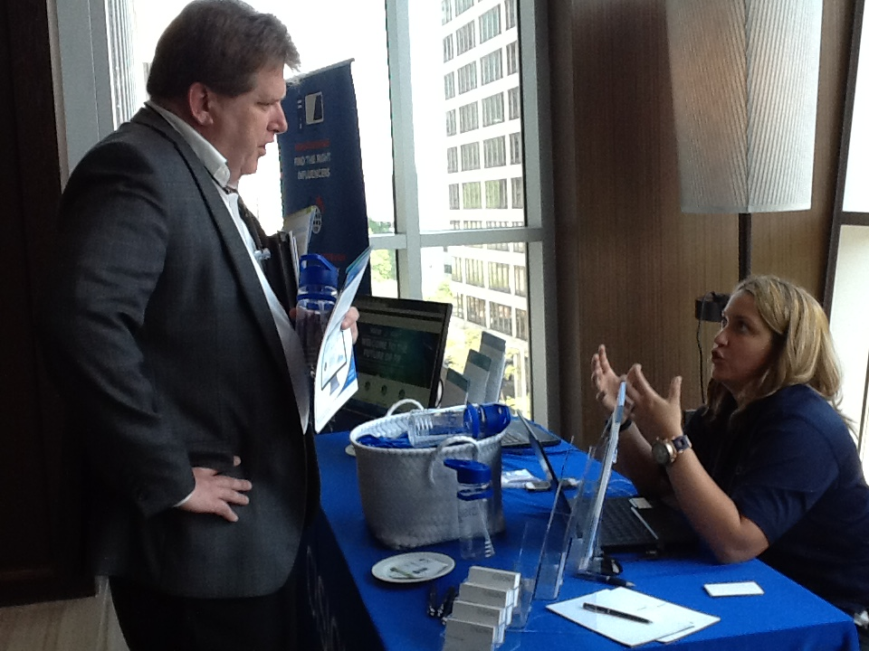 PRSAHealth's tweet photo. #PRSAHealth Executive Committee Member Chris Boyle visiting @Cision's table at the 2015 Conference. http://t.co/EMO00UaK1e